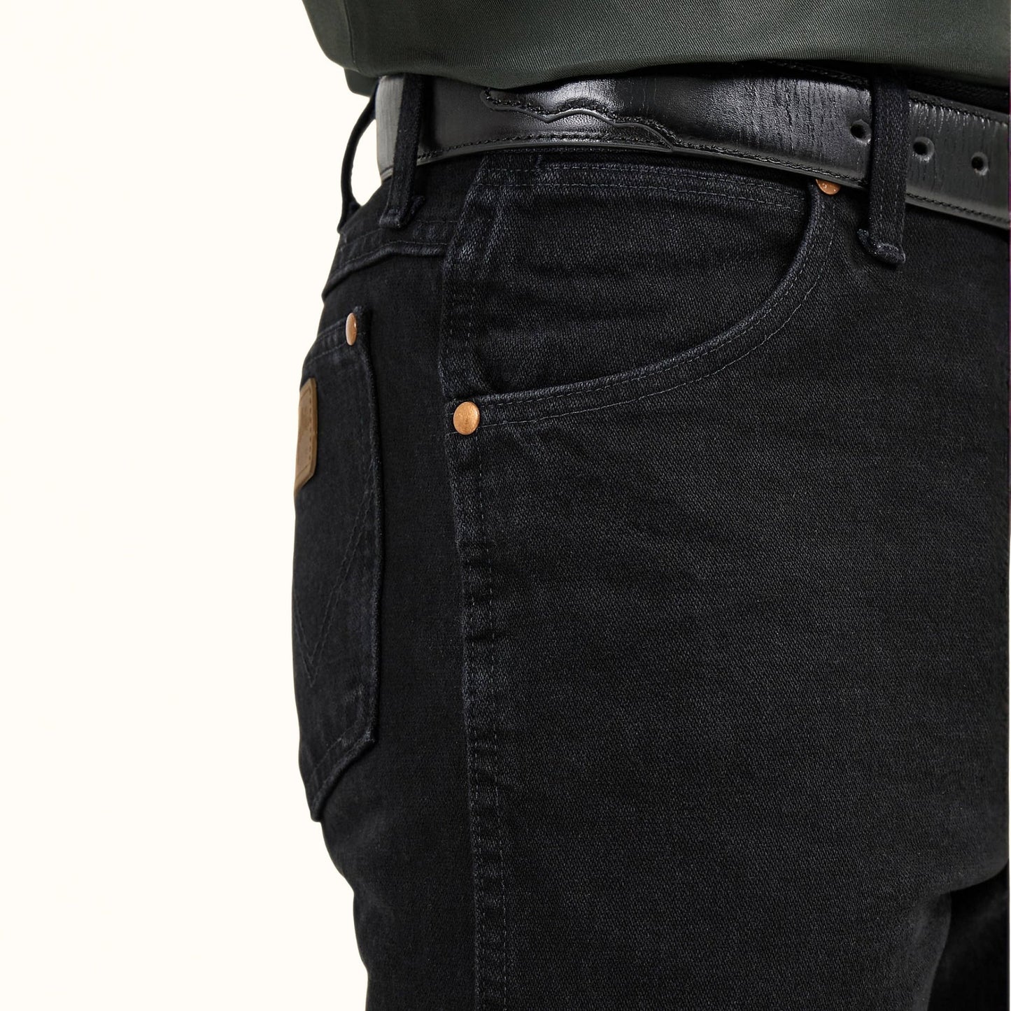 Wrangler Cowboy Cut Original Fit black jeans denim fabric close-up