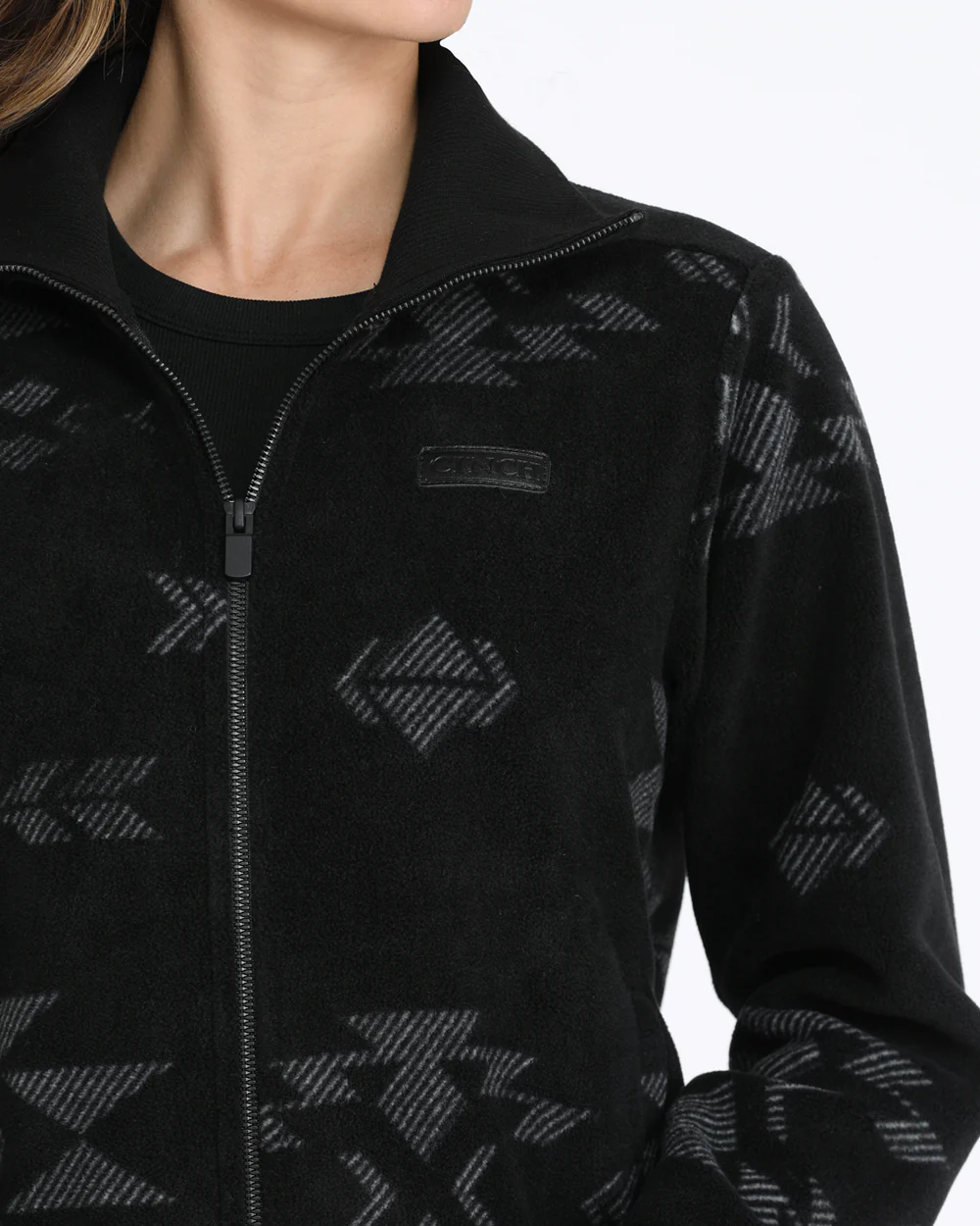 Close-up view of Cinch Full Zip Polar Fleece Jacket pattern and zipper