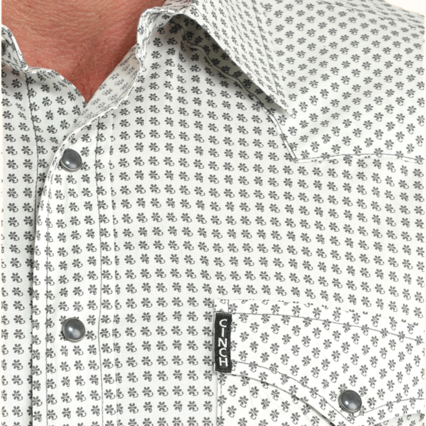 Close-up of Cinch Printed Button Down Shirt printed fabric pattern