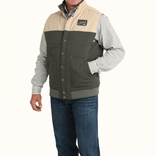 Front view of Cinch Reversible Vest in green and tan