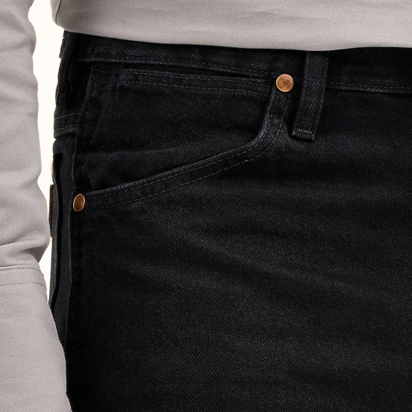 Black denim pocket detail on Wrangler Cowboy Cut Slim Fit Jean