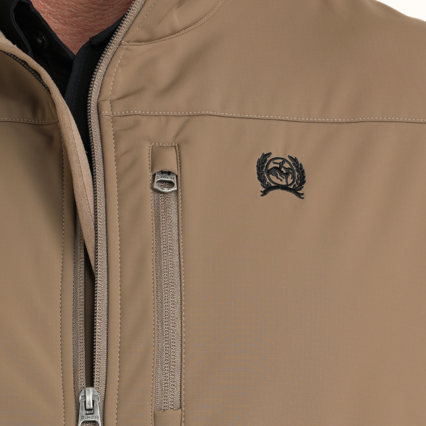 Cinch Men’s Windproof Vest chest logo and zipper detail