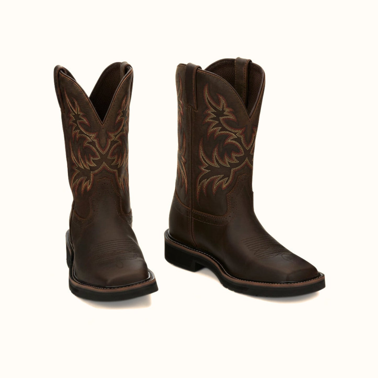 Justin Driller 11 Inch Work Boot pair in brown leather with stitched shaft detail