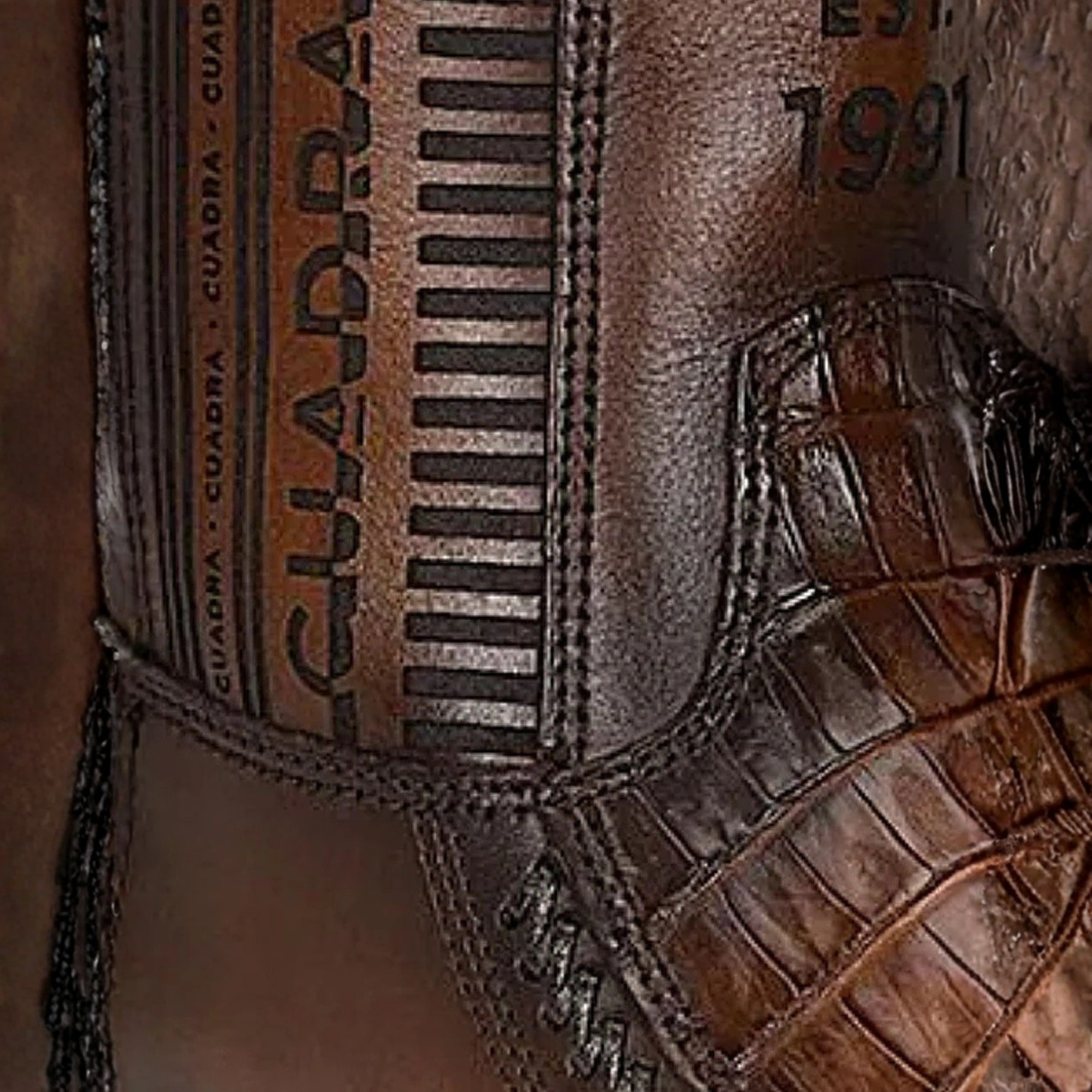 Close-up view of Cuadra Caiman Laser & Woven Narrow Square Toe Boot laser engraving and woven leather detail
