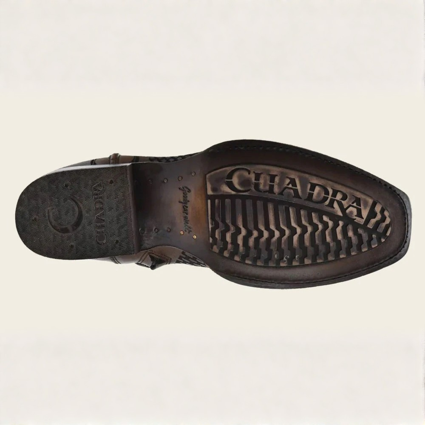 Outsole view of Cuadra Denver Brown Laser & Woven Narrow Square Toe Boot