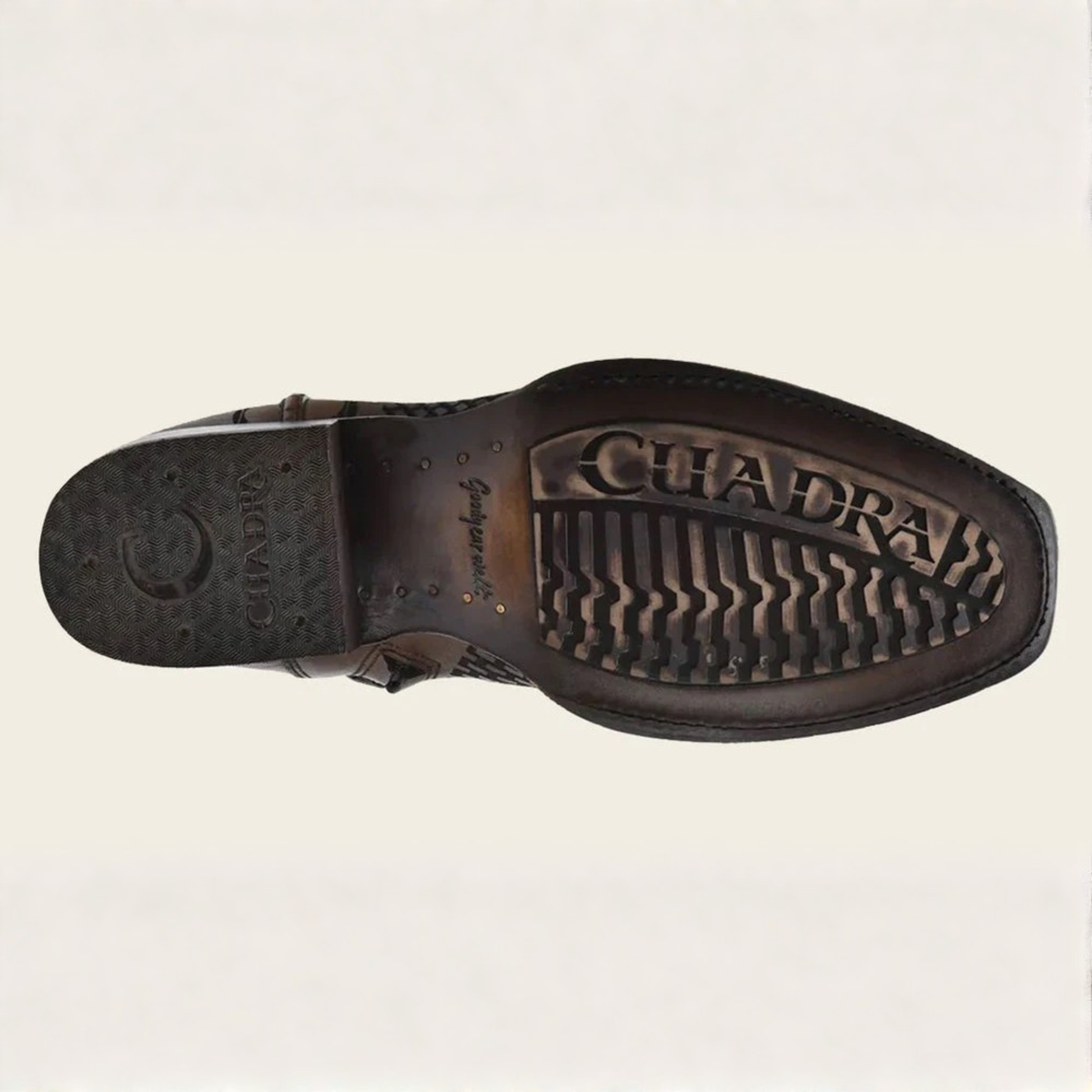Outsole view of Cuadra Denver Brown Laser & Woven Narrow Square Toe Boot