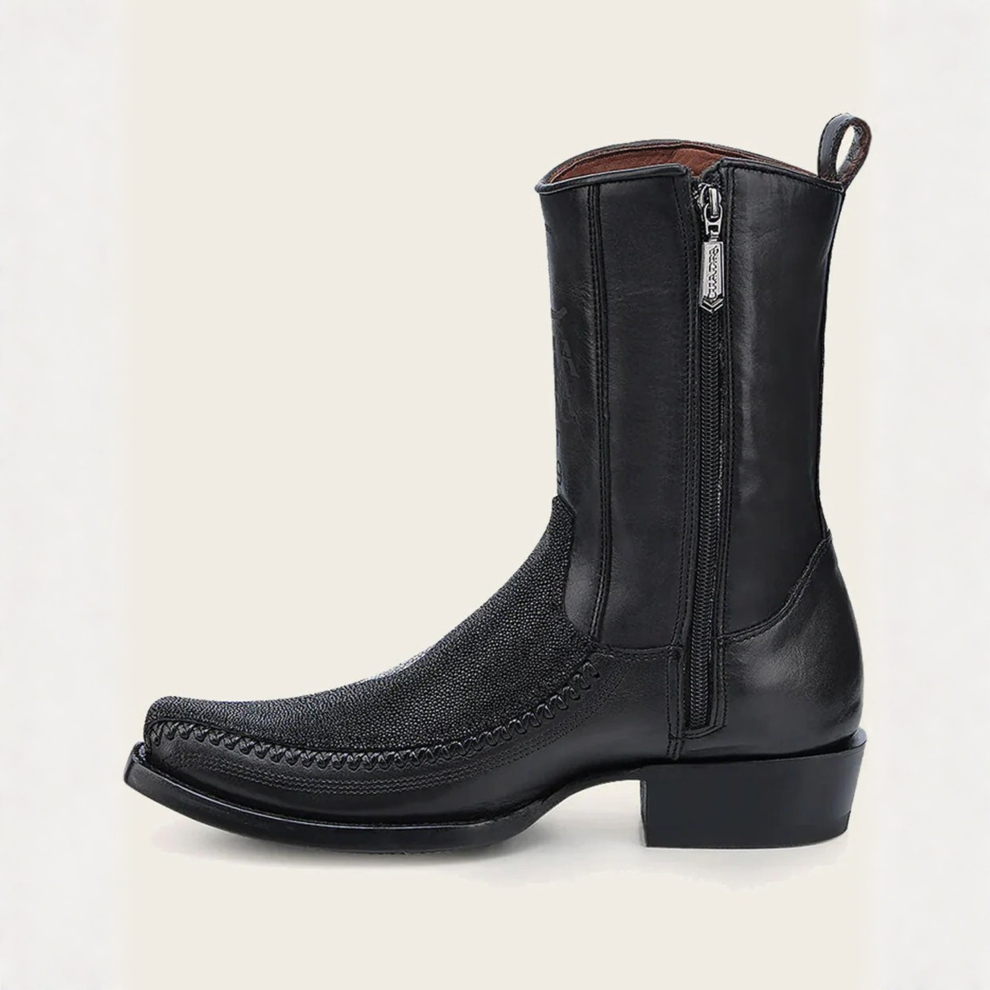 Side profile view of Cuadra Engraved Black Stingray Cowboy Boot