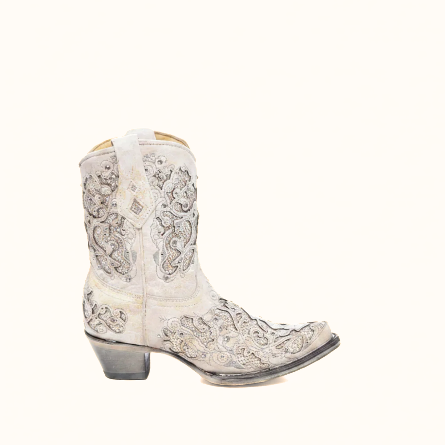 Side profile of Corral white wedding cowboy bootie with crystal detailing