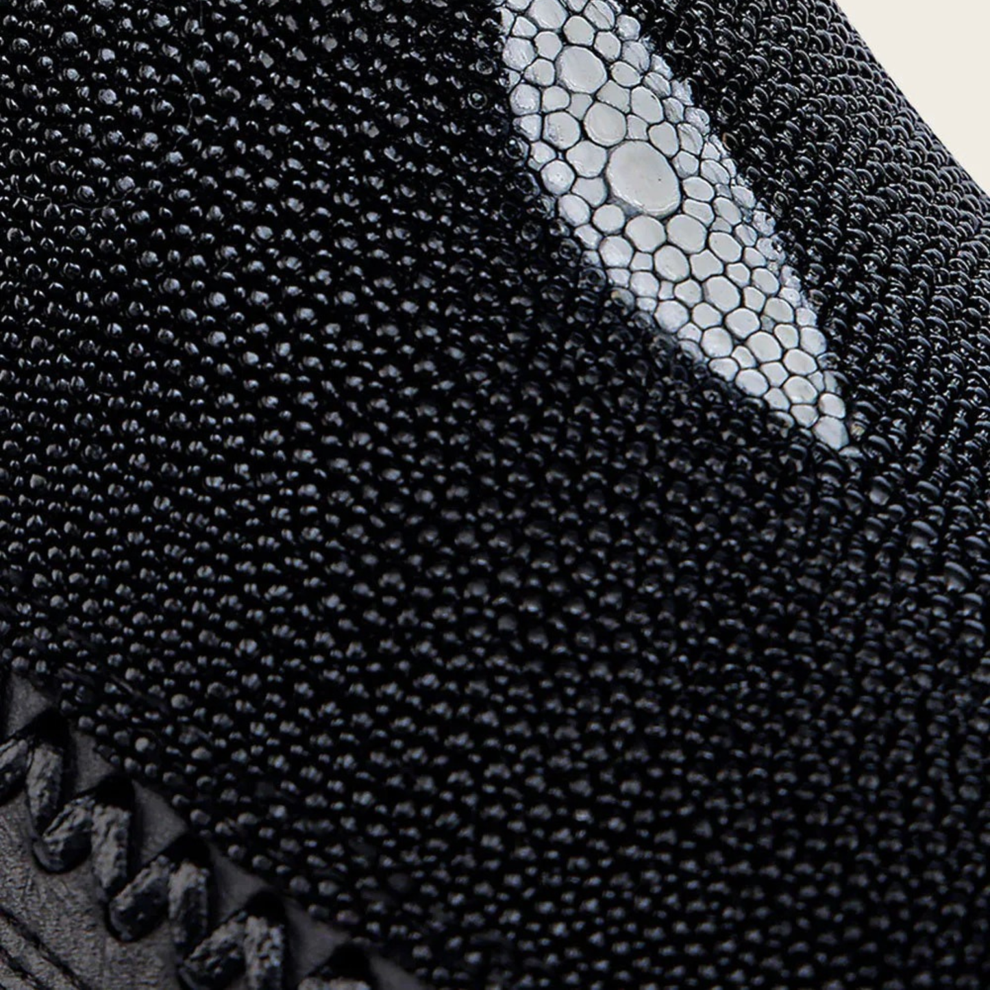 Close-up view of stingray leather detail on Cuadra Engraved Black Stingray Cowboy Boot