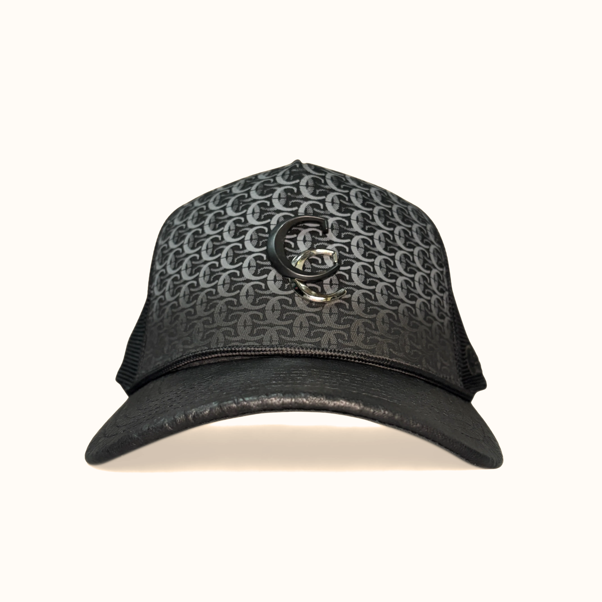Front view of black Cuadra patterned cap with embroidered logo patch