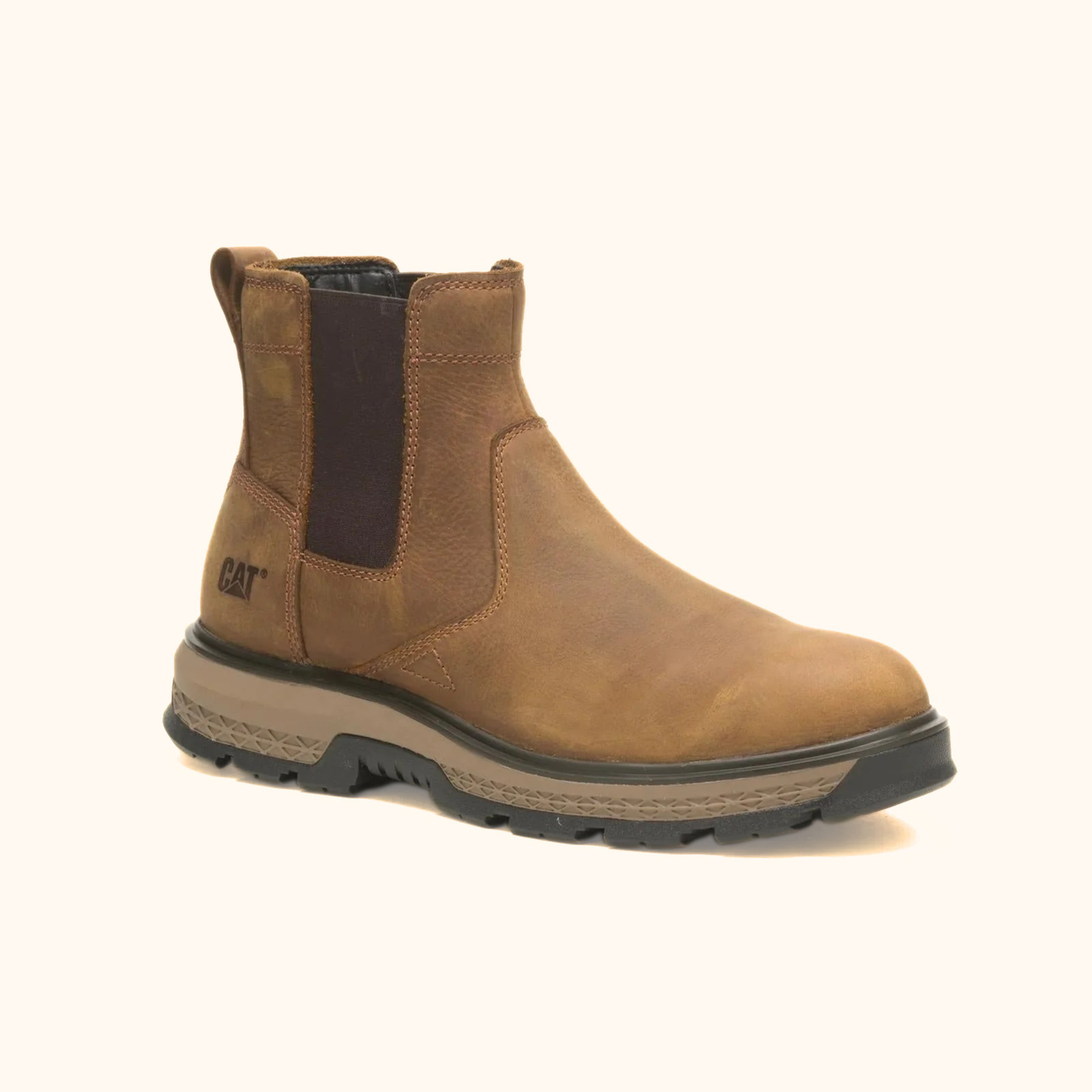 CAT Exposition Chelsea Work Boot angled side view in beige leather