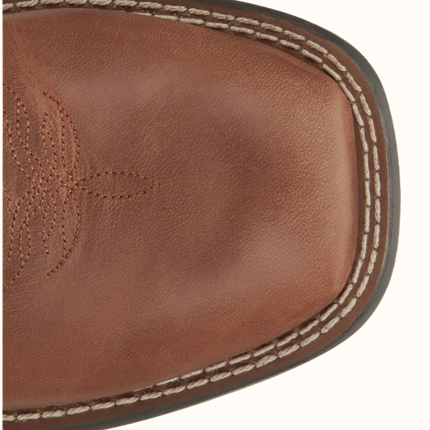 Justin Canter Junior Boot close-up of broad square toe in brown leather