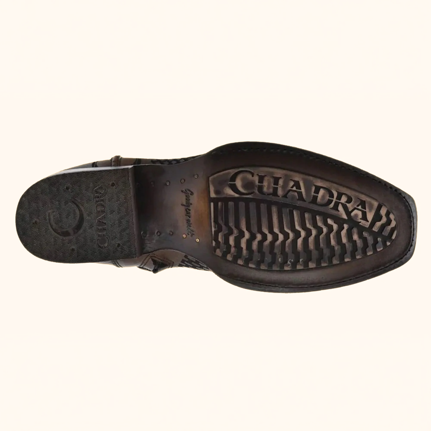 Outsole view of Cuadra Denver Brown Laser & Woven Narrow Square Toe Boot