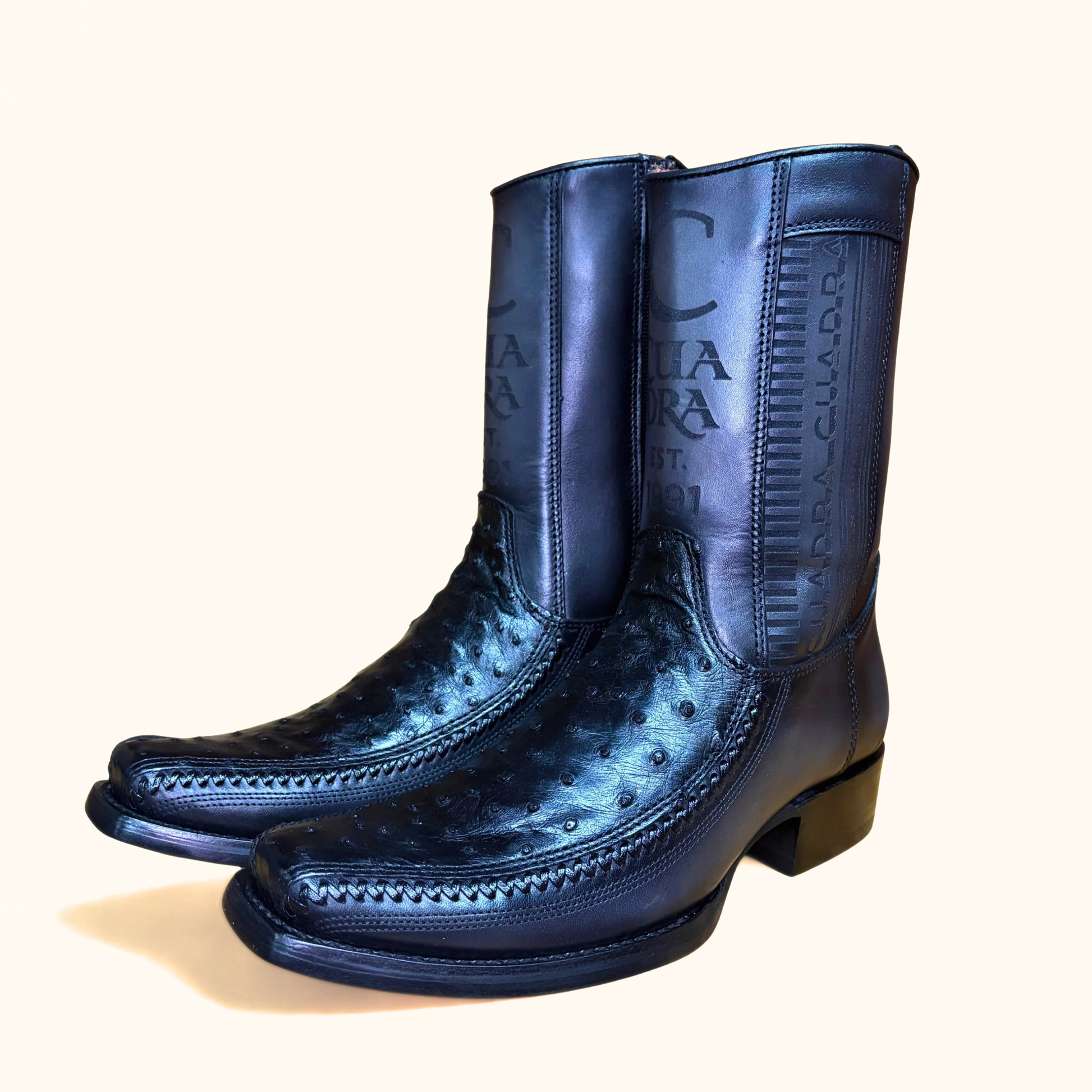 Pair of Cuadra Black Ostrich Lazer & Woven Narrow Square Toe Boots side profile in black leather