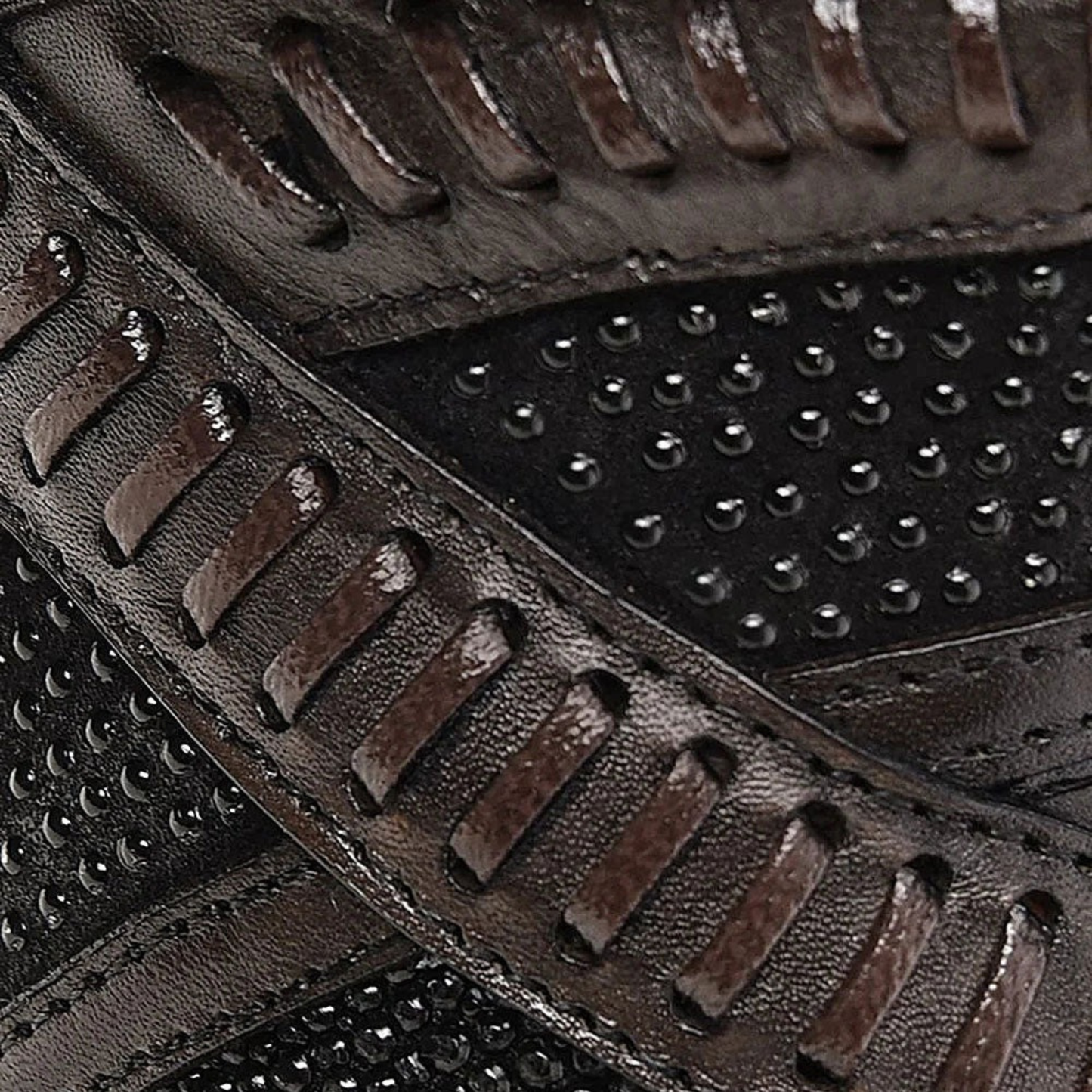 Close-up view of stingray leather and woven detail on Cuadra Tall Black Stingray Boot