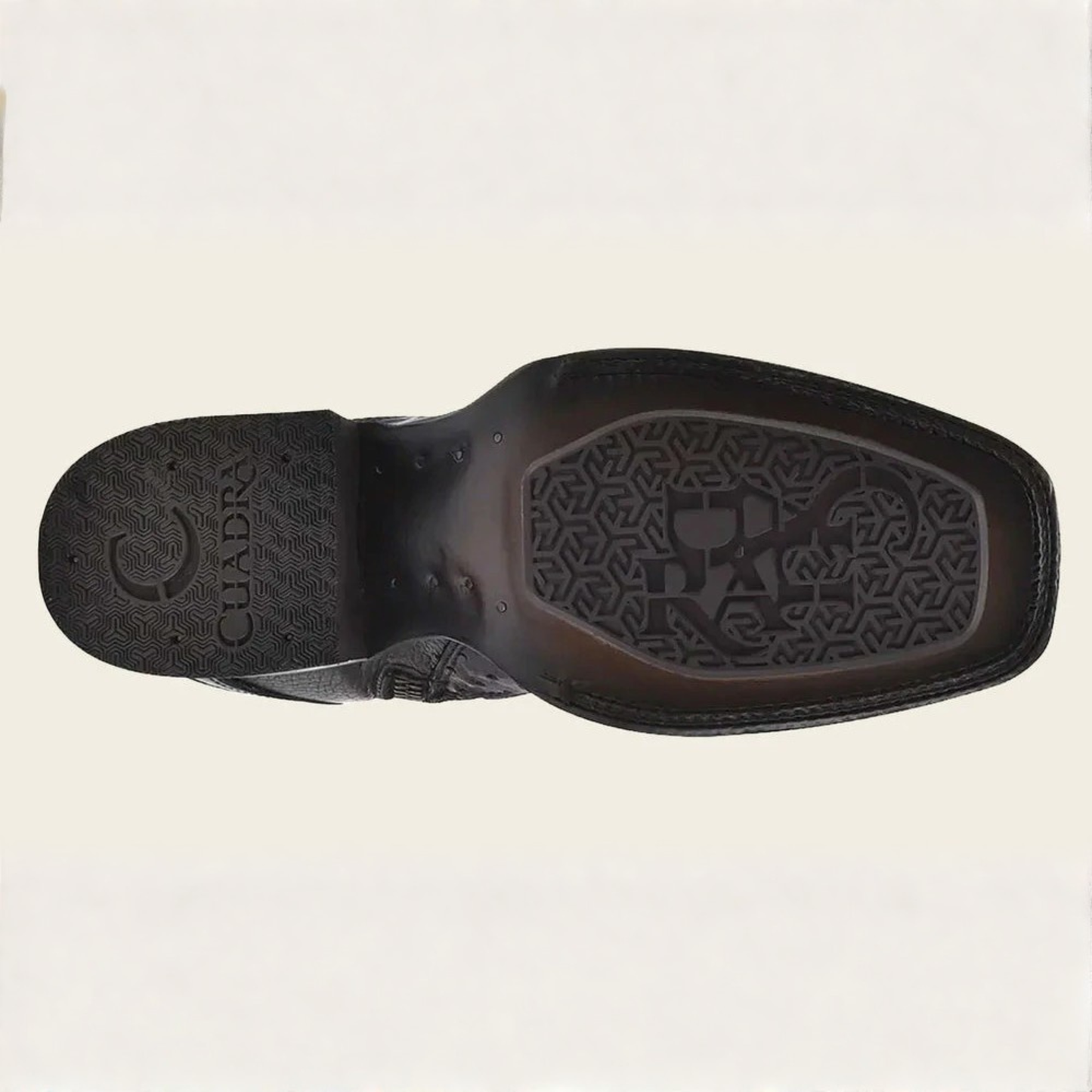 Outsole view of Cuadra Black Ostrich Zipper & Elastic Square Toe Boot