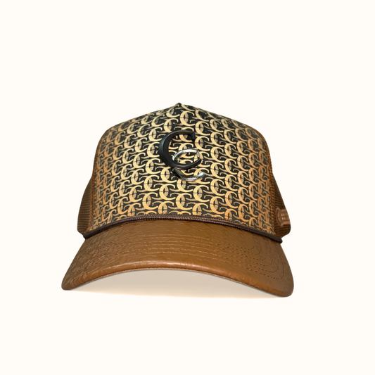 Front view of Cuadra patterned brown cap with logo patch