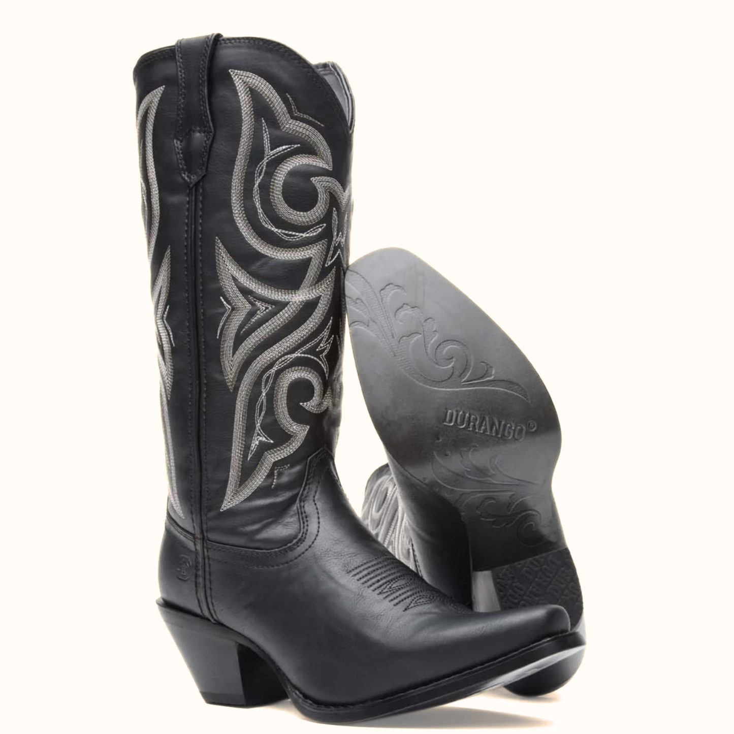 Pair of Crush by Durango Black Beauty Western Boot angled side view and outsole in black leather