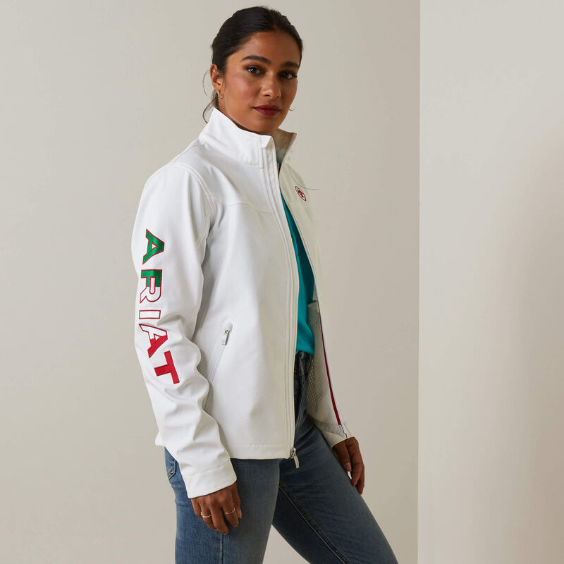 Woman wearing Ariat Classic Team Softshell Mexico Water Resistant Jacket in white front view