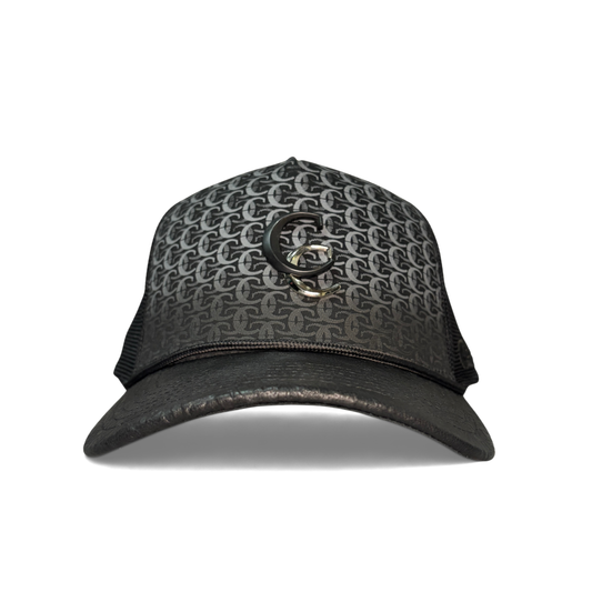 Front view of black Cuadra patterned cap with embroidered logo patch