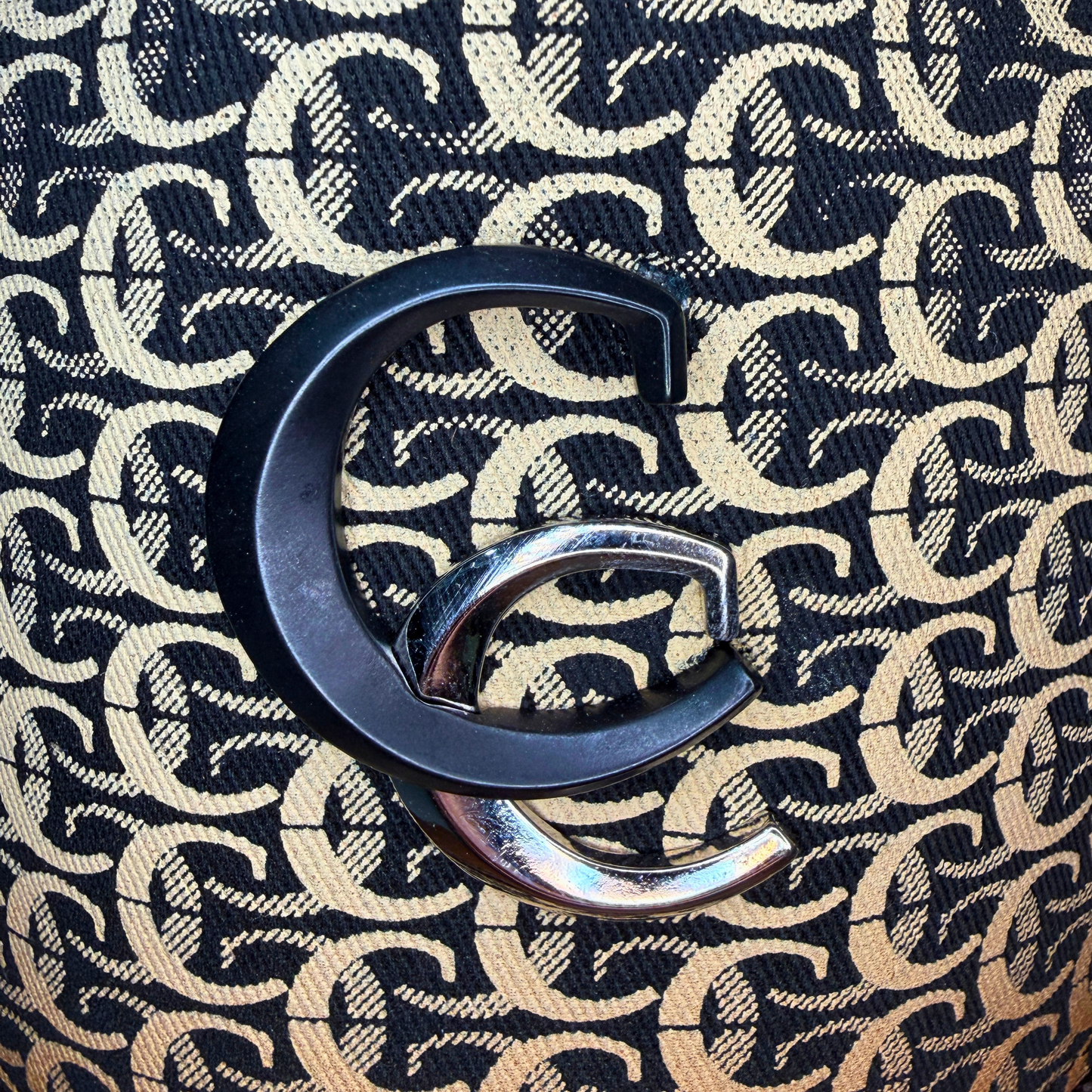 Close-up detail of patterned fabric on Cuadra brown cap