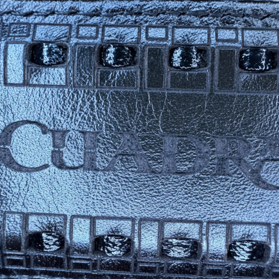 Close-up of Cuadra Men’s Black Stingray Lazer and Woven Belt texture and pattern detail