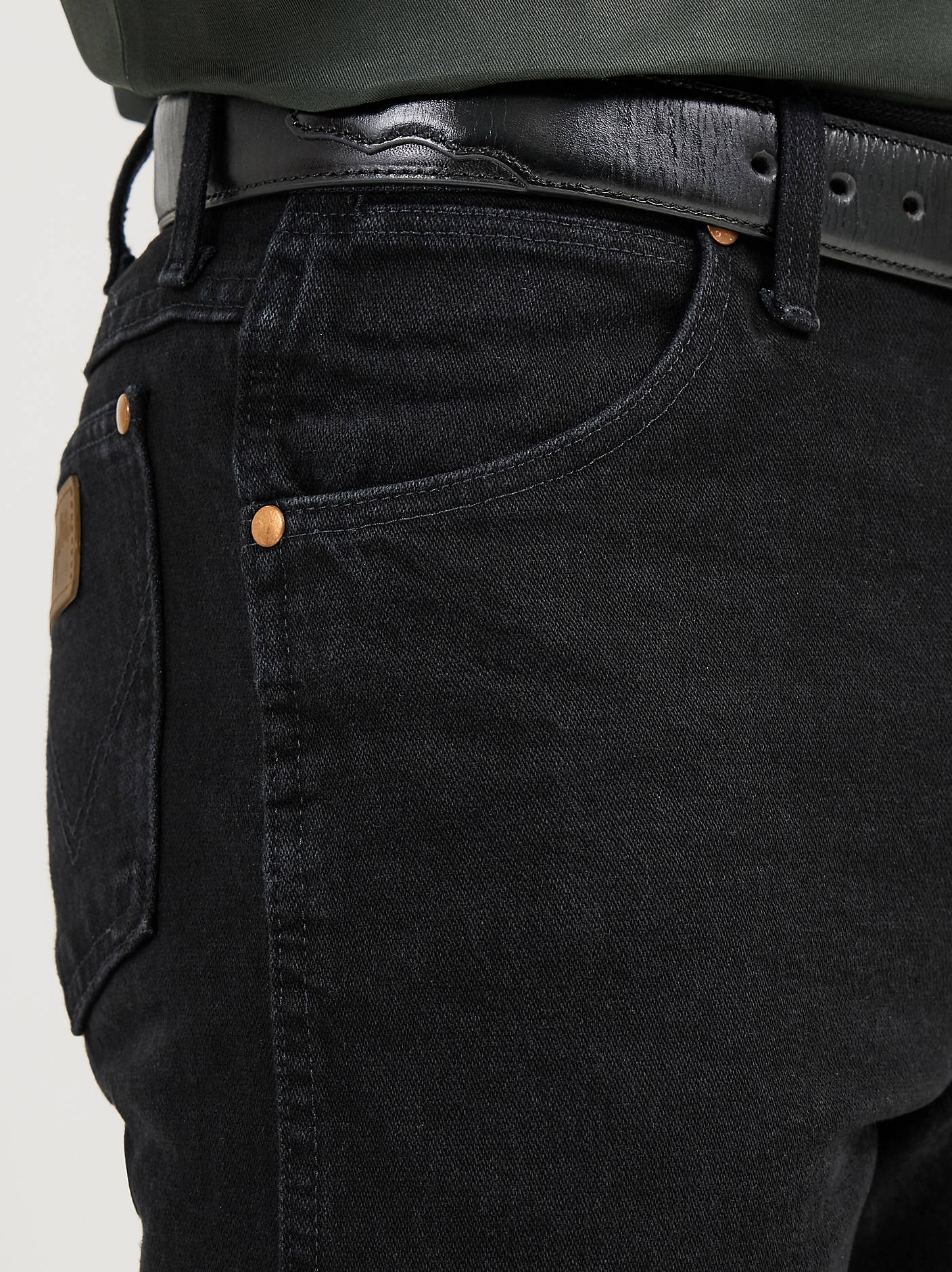Wrangler Cowboy Cut Original Fit black jeans denim fabric close-up