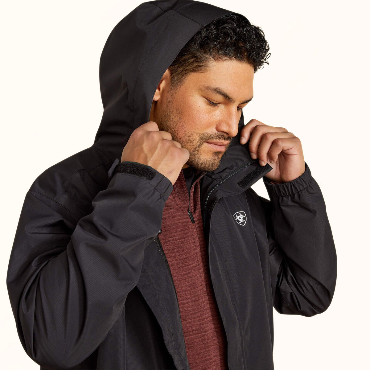 Ariat Rebar Stormshell Waterproof Jacket in black front hood view