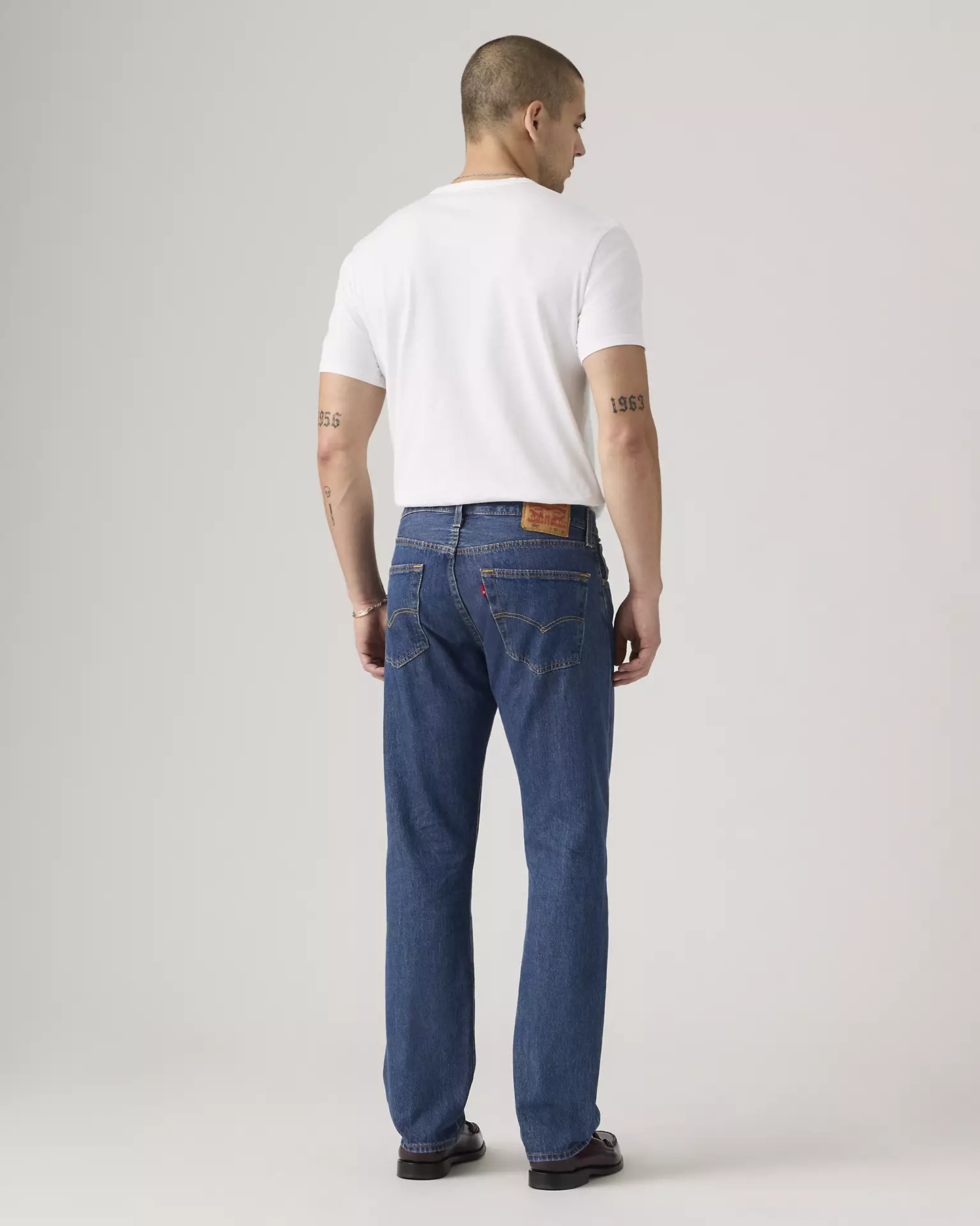 Levi’s 501 Original Fit men’s blue jeans full-length back view