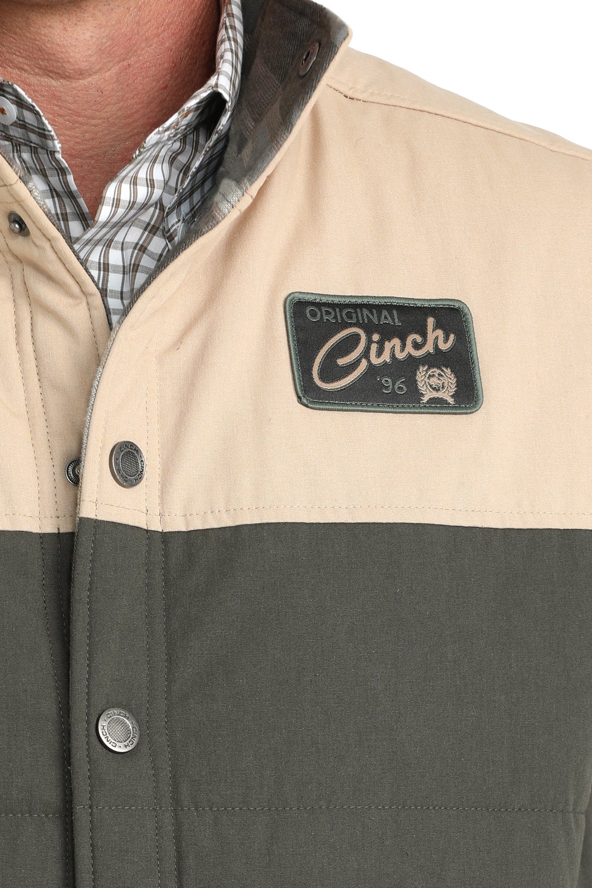 Close-up of Cinch Reversible Vest chest logo patch