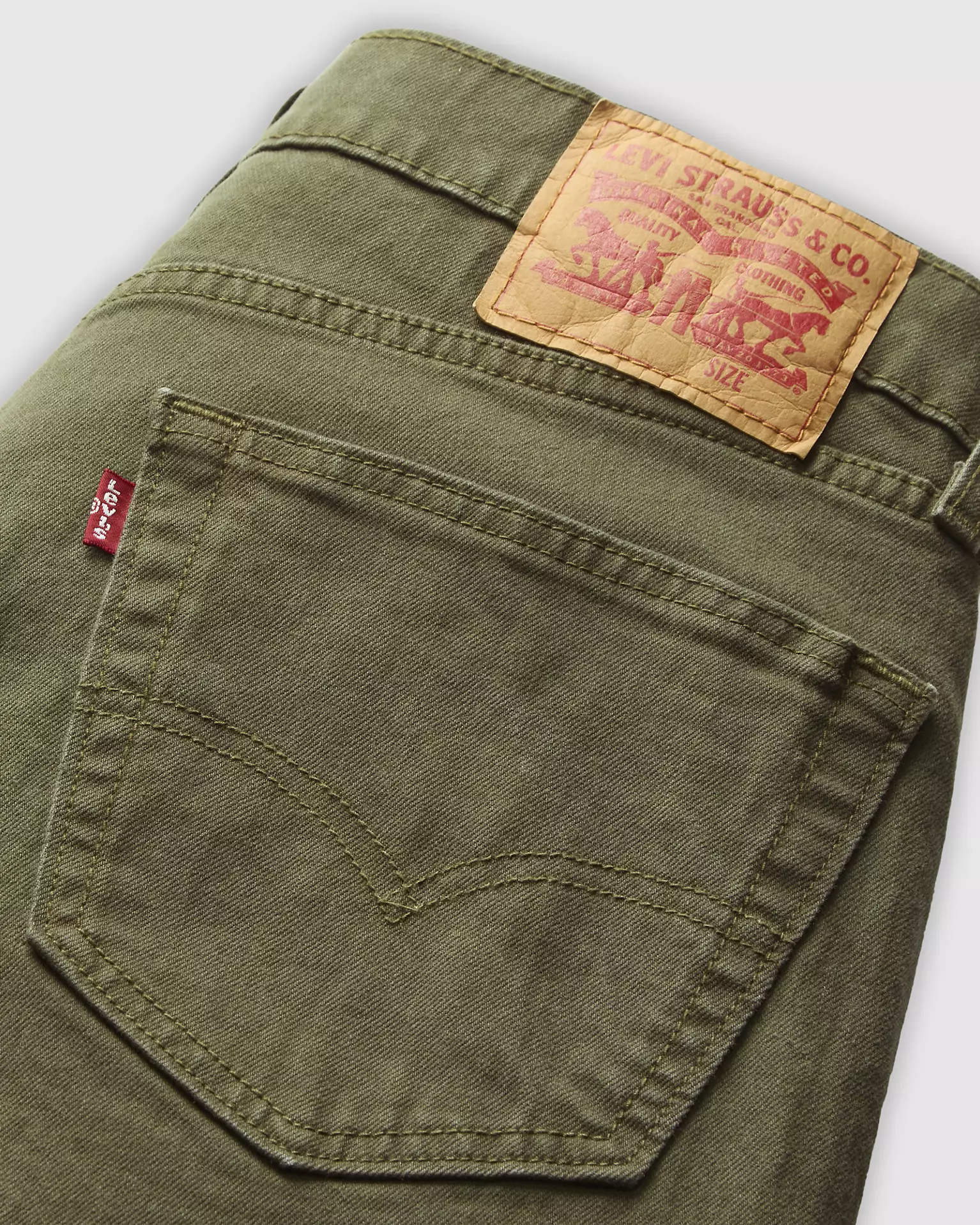 Close-up view of Levi’s leather back patch on 505 Regular Men’s Jeans