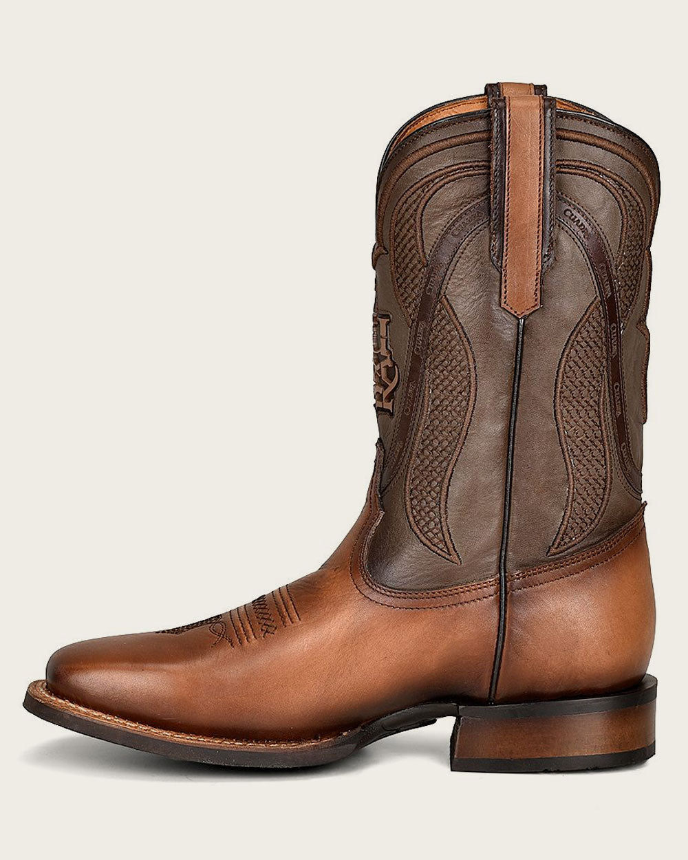 Botas vaqueras de cuero con diseño de Rodeo grabadas