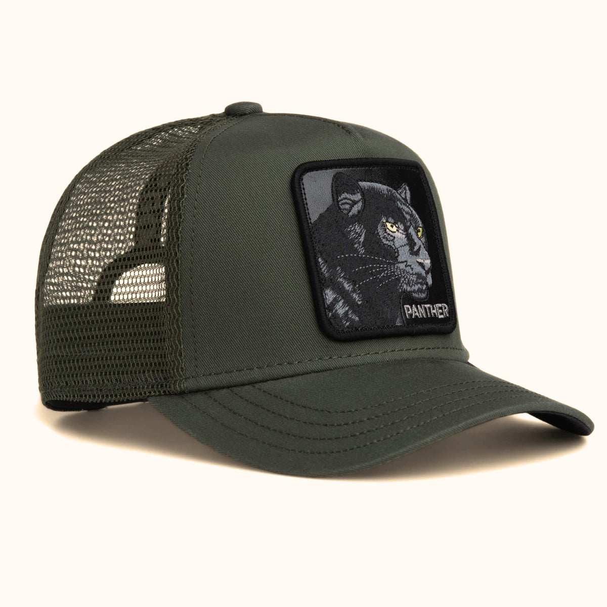 Goorin Panther olive trucker hat front angle view
