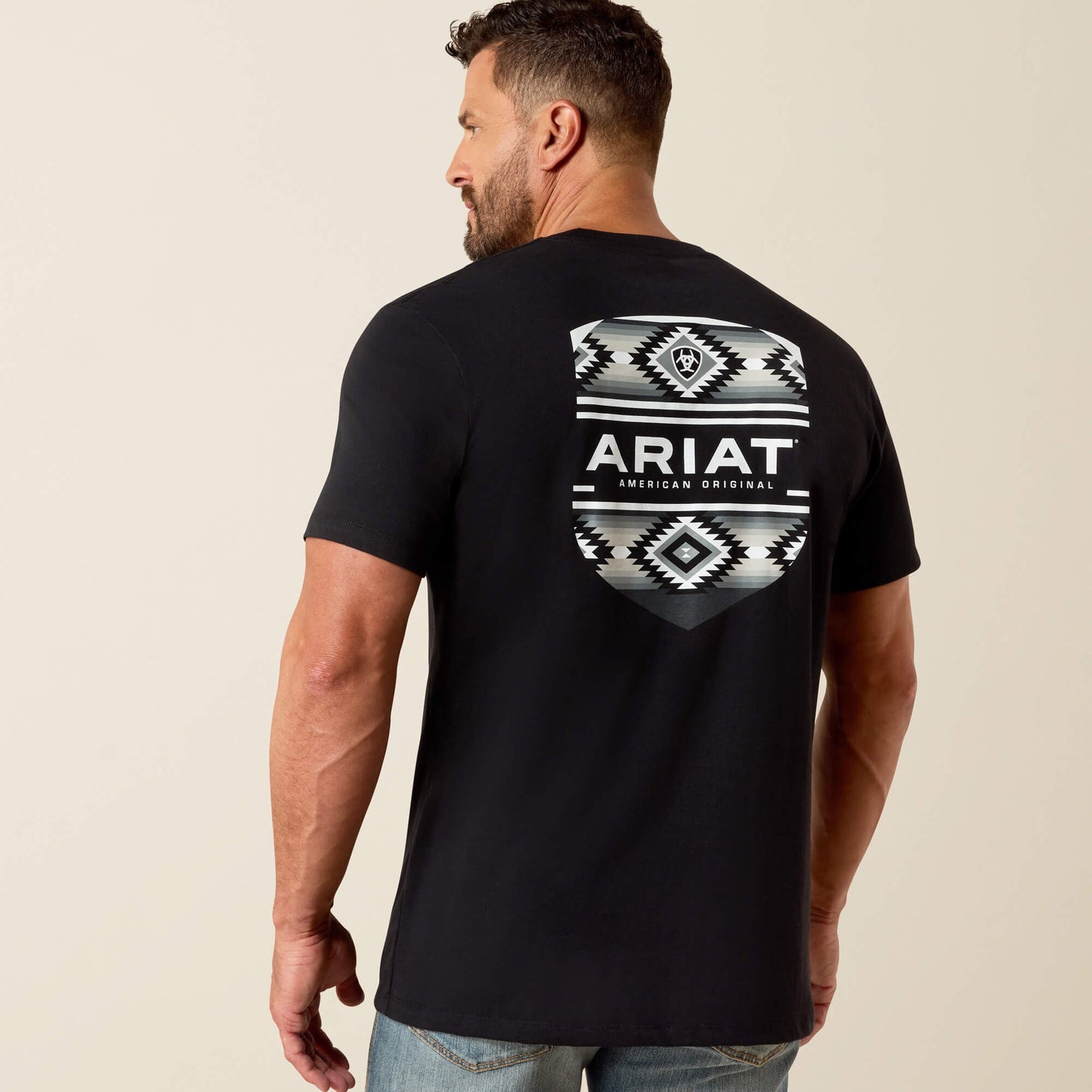 Ariat Canyon Aztec Shield Classic Fit T-Shirt back view on model in black with large Aztec shield graphic