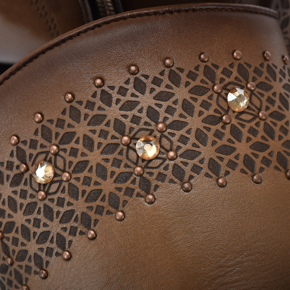 Close-up of crystal embellishment on Cuadra Honey Perforated Crystal Ankle Bootie