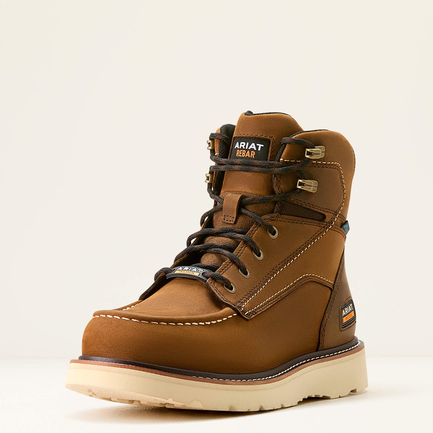 Ariat brown lace-up work boot angled front view with wedge sole