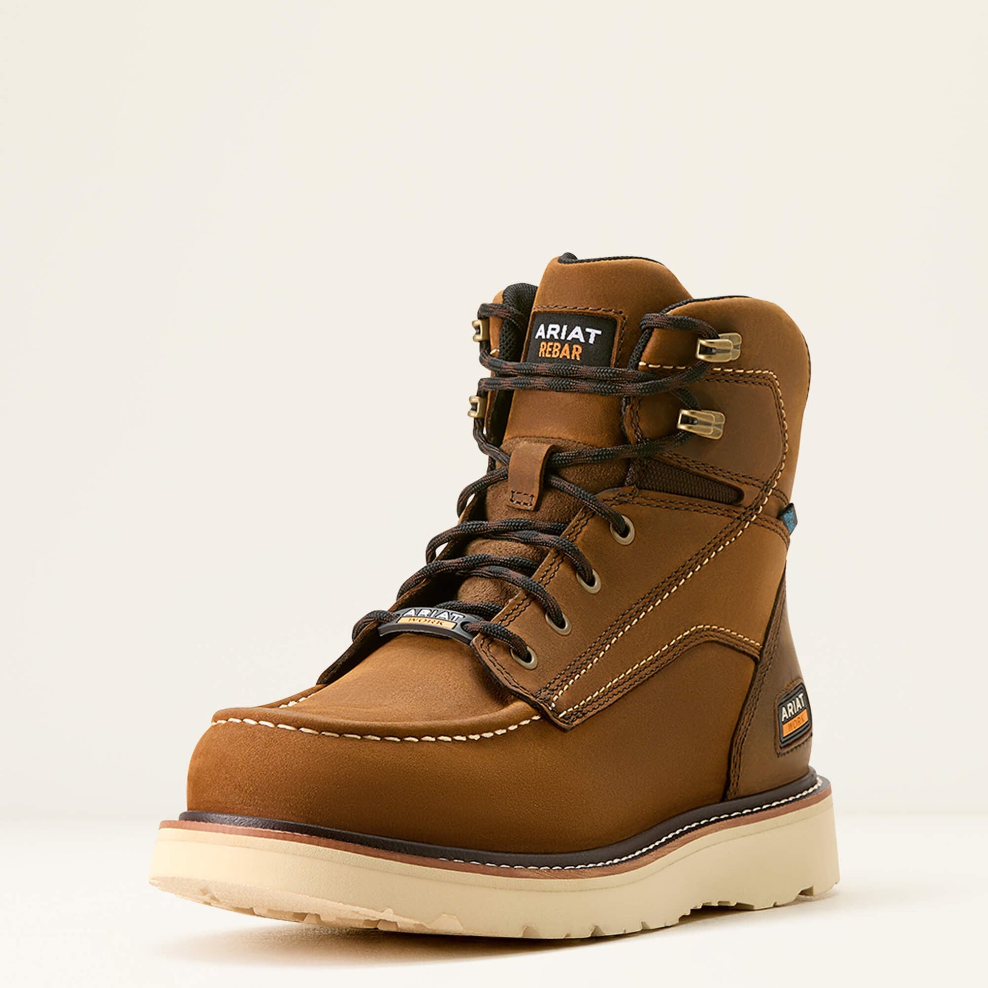Ariat brown lace-up work boot angled front view with wedge sole