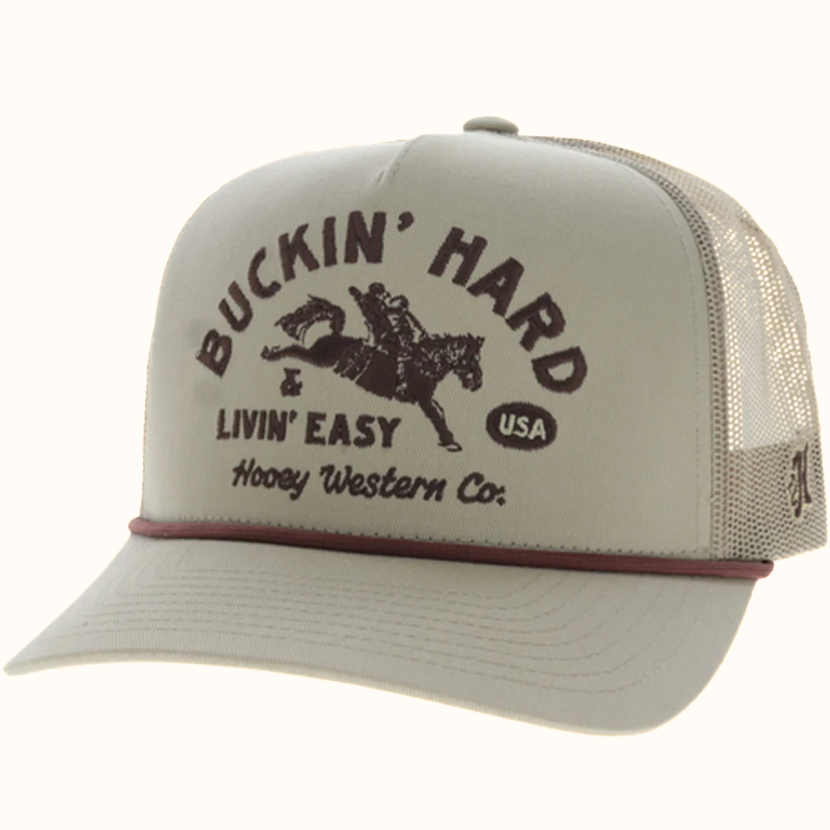 Hooey Buckin’ Hard tan 5-panel trucker hat front angle view