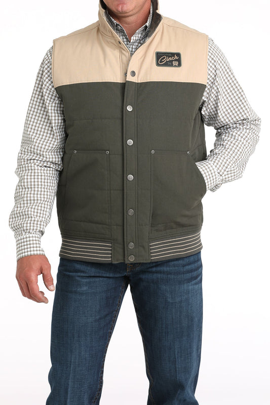 Front view of Cinch Reversible Vest in green and tan