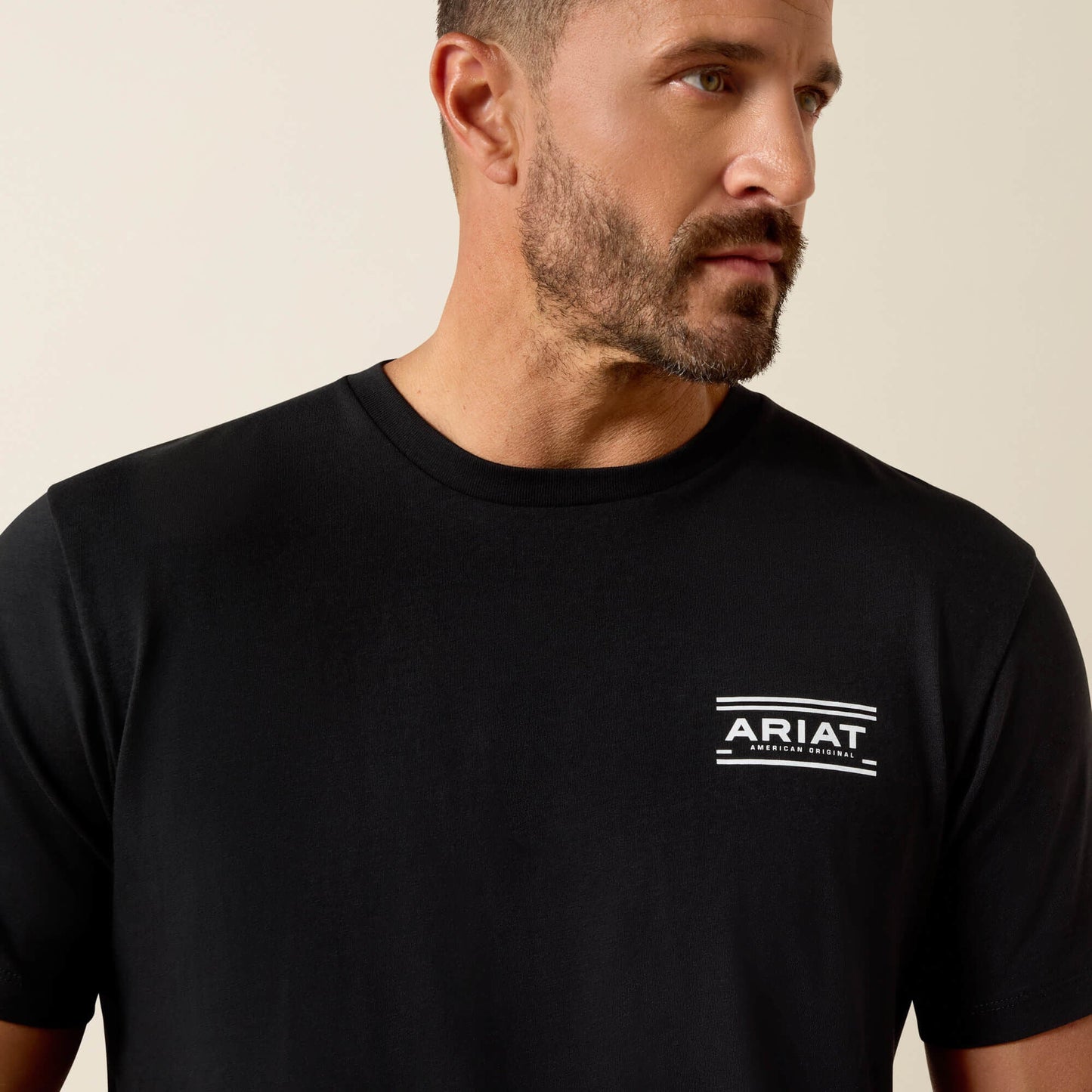 Ariat Canyon Aztec Shield Classic Fit T-Shirt close-up front chest logo on model in black