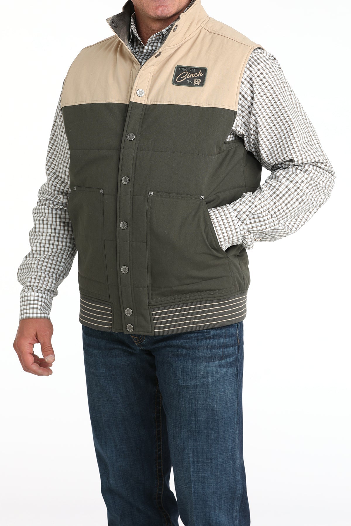 Front view of Cinch Reversible Vest in green and tan