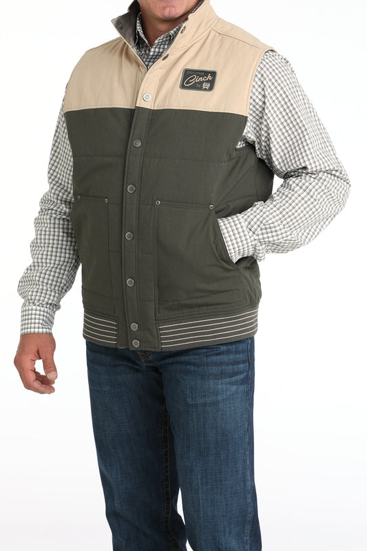 Front view of Cinch Reversible Vest in green and tan