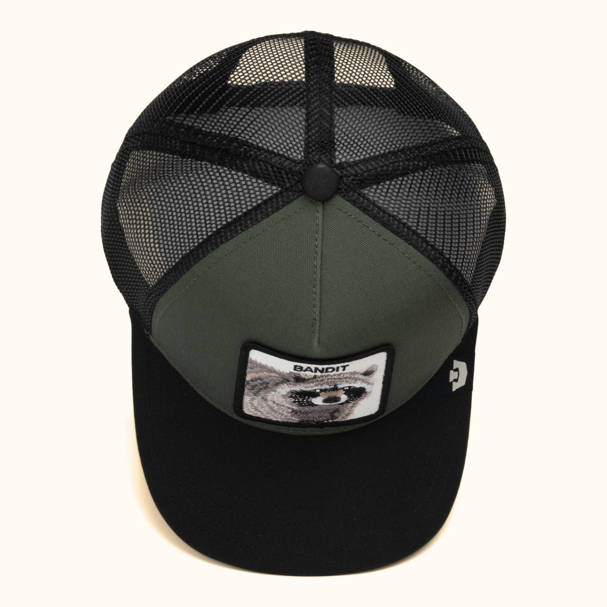 Goorin Bandit olive and black trucker hat top view