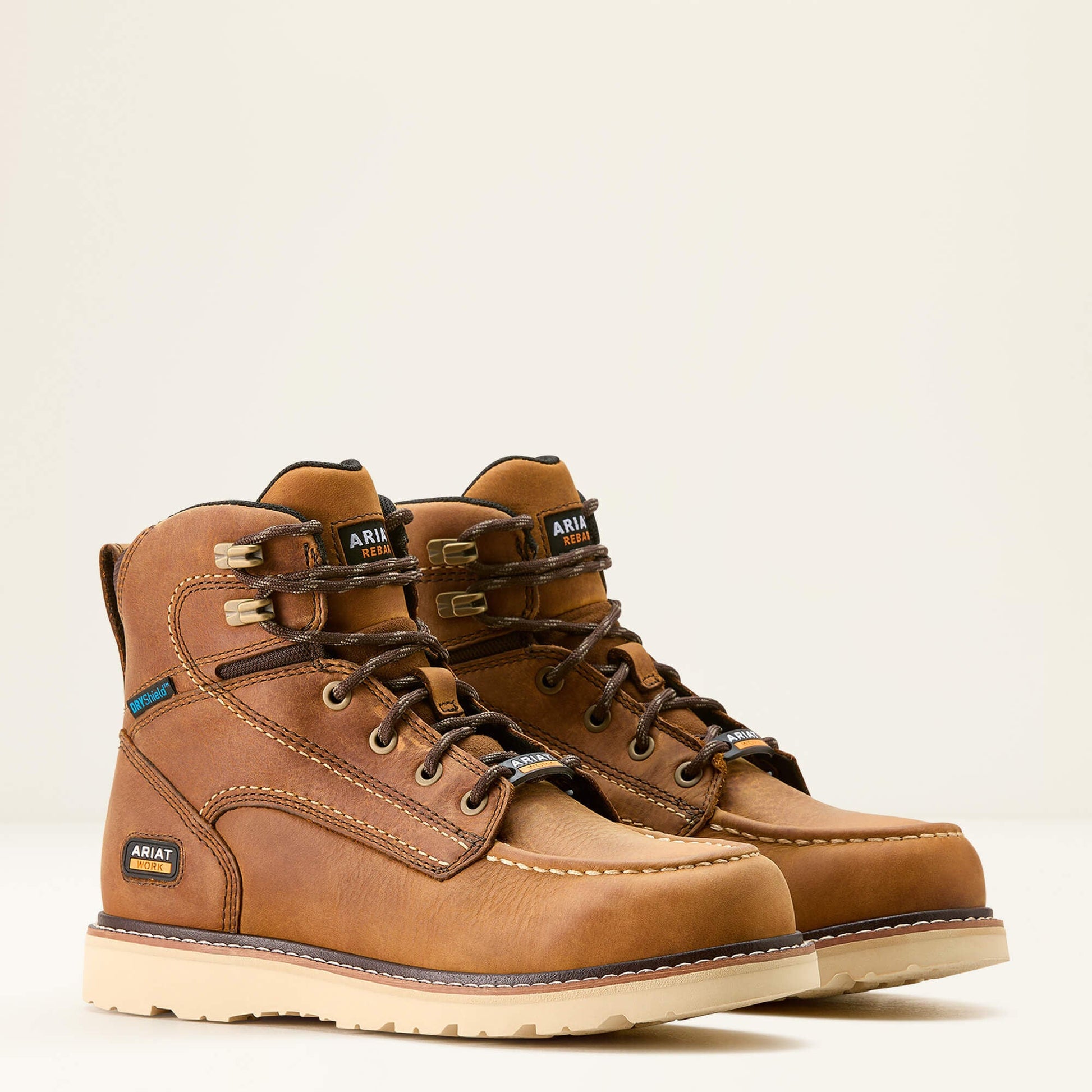 Ariat Rebar Wedge Moc Toe Waterproof Work Boot angled side pair view
