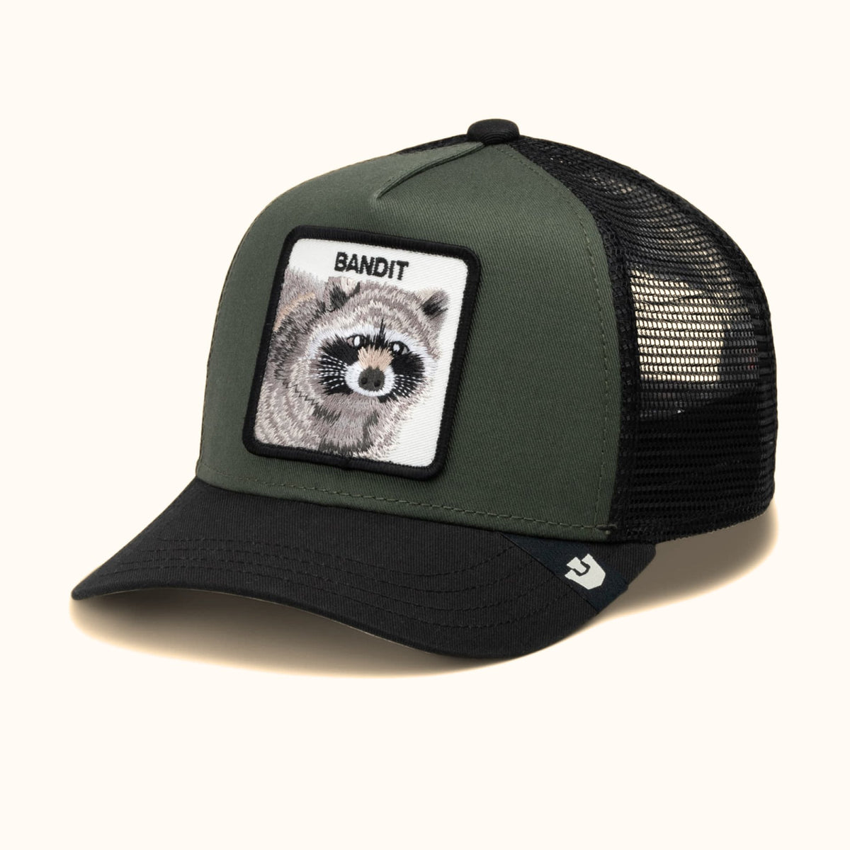 Goorin Bandit olive and black trucker hat front angle view
