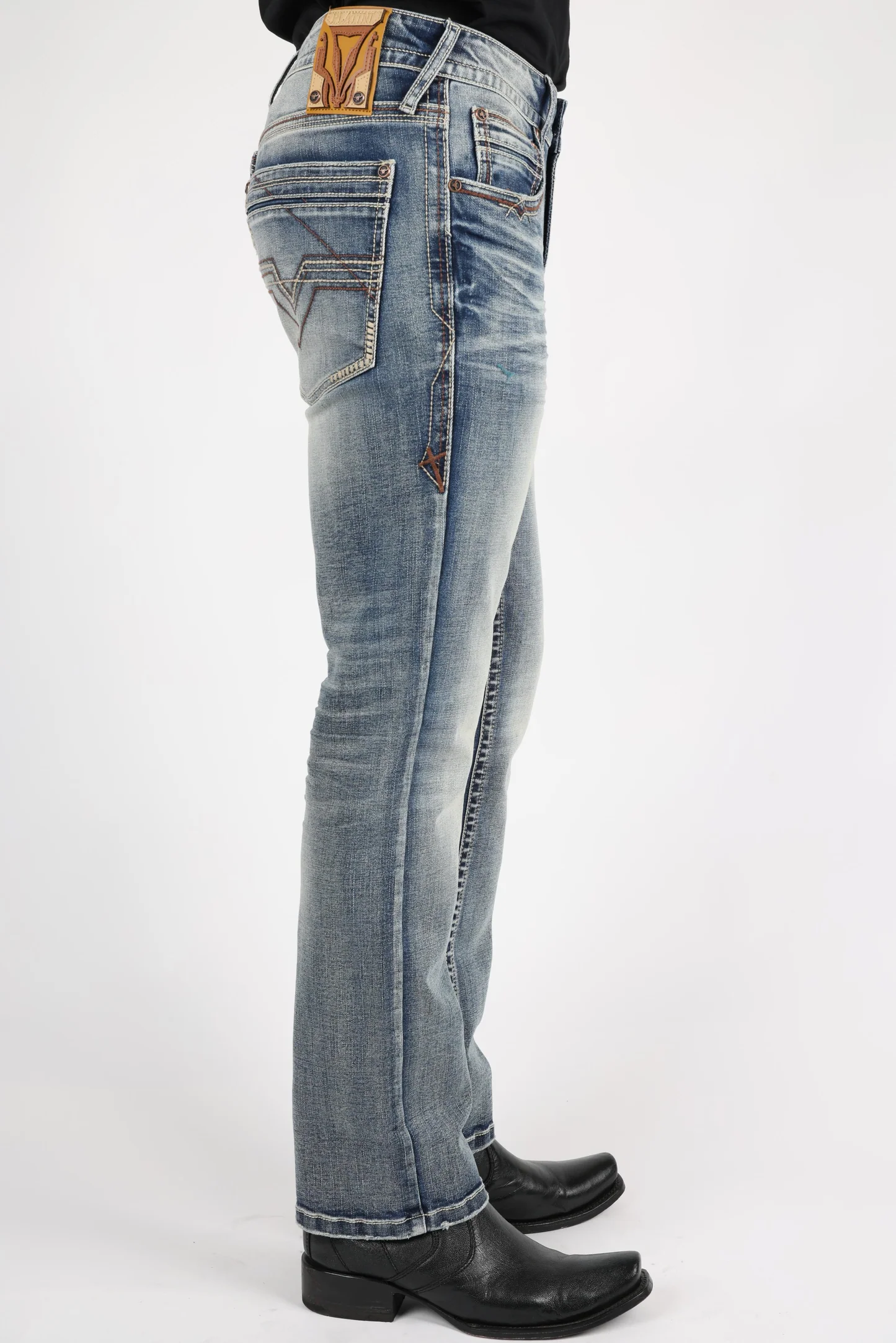 Platini Holt men’s blue boot cut jeans side profile view
