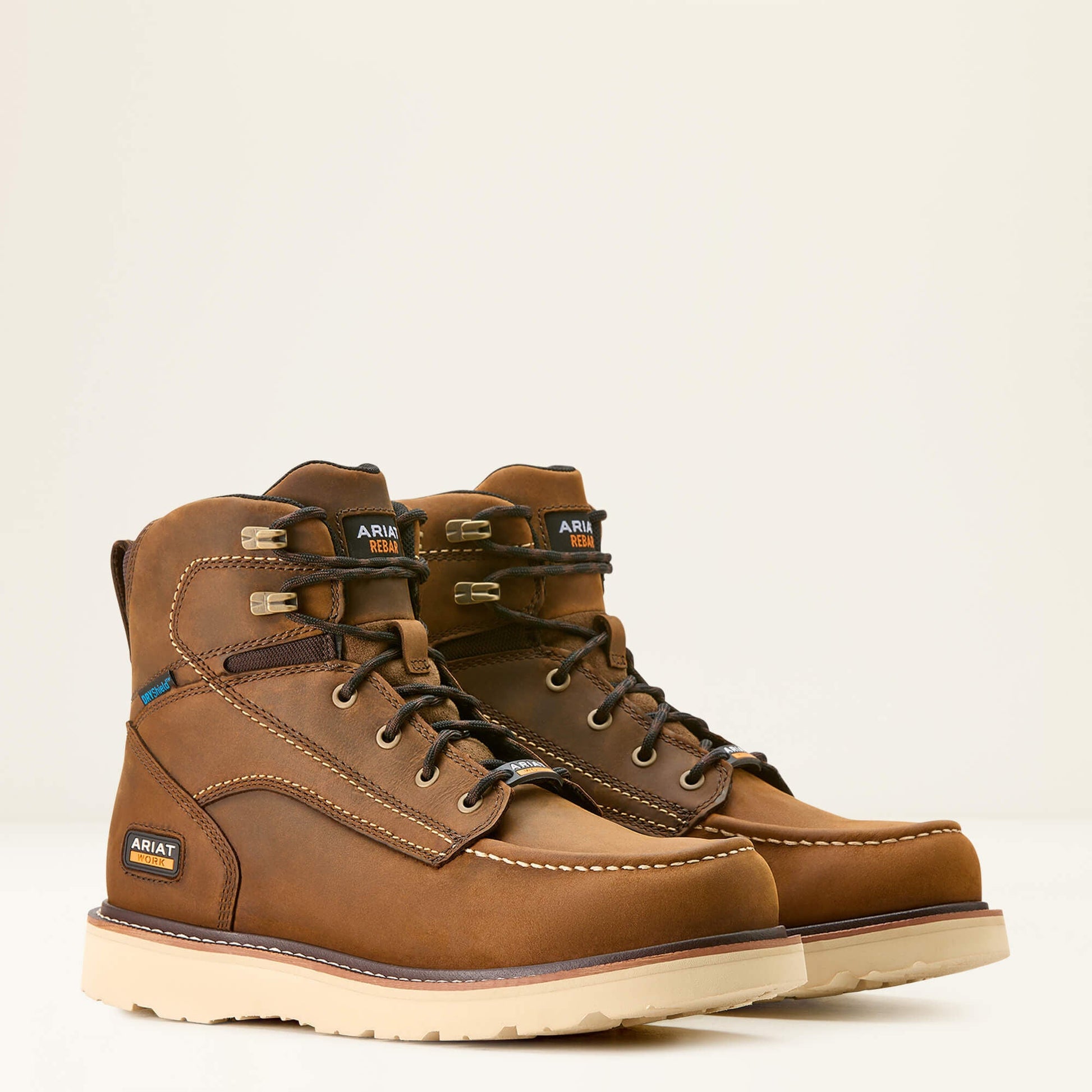 Pair of Ariat brown lace-up work boot side profile view