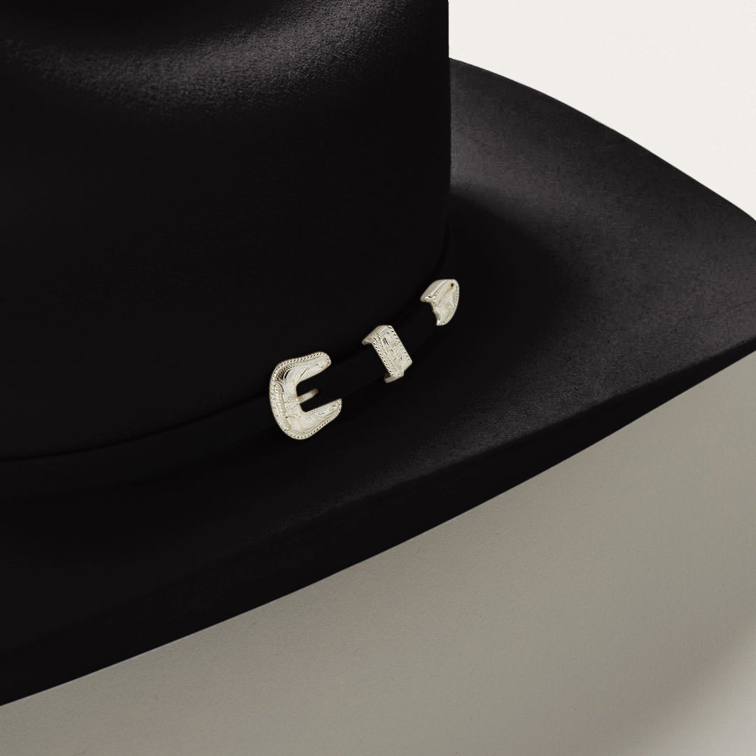 Close-up of hatband and silver buckle detail on Stetson Deadwood 4X Black Cowboy Hat